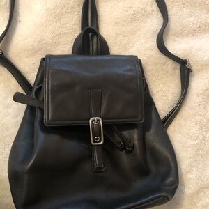 Coach Black Leather Backpack
Vintage “Coach” drawstring backpack purse